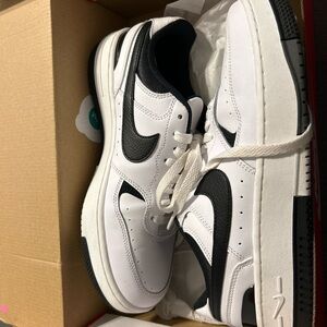 Nike women’s Black and White Sneakers